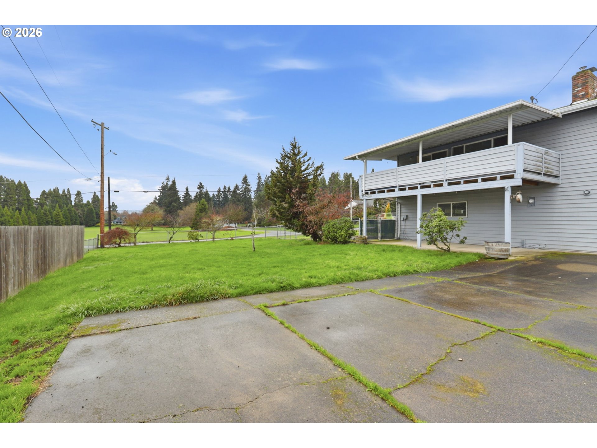 52890 Northwest 7th Street Scappoose, OR 97056 - Photo 40 of 48 a front view of a house with a yard