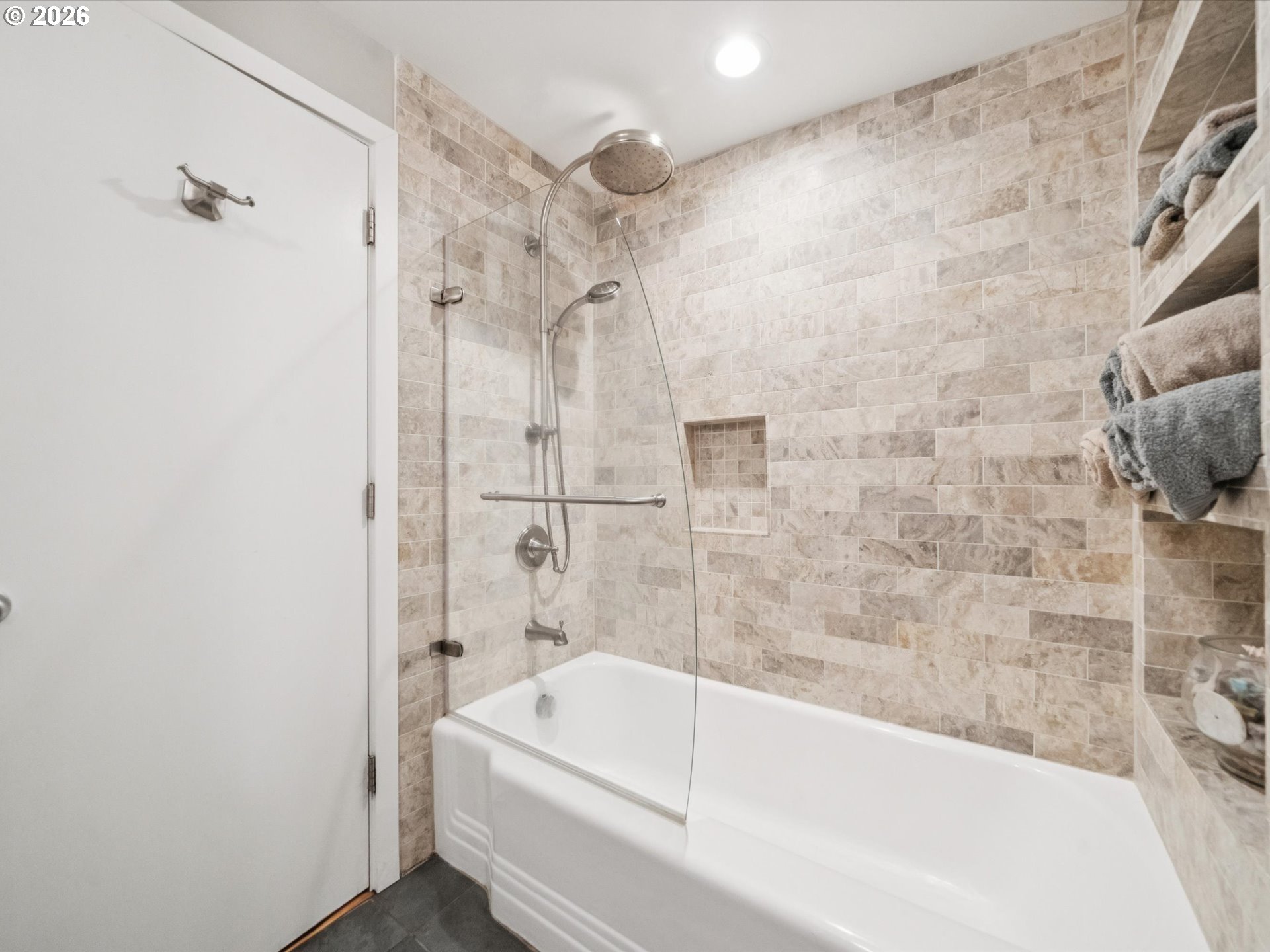 8401 Southwest Canyon Lane Portland, OR 97225 - Photo 34 of 48 a bathroom with a bathtub and a shower
