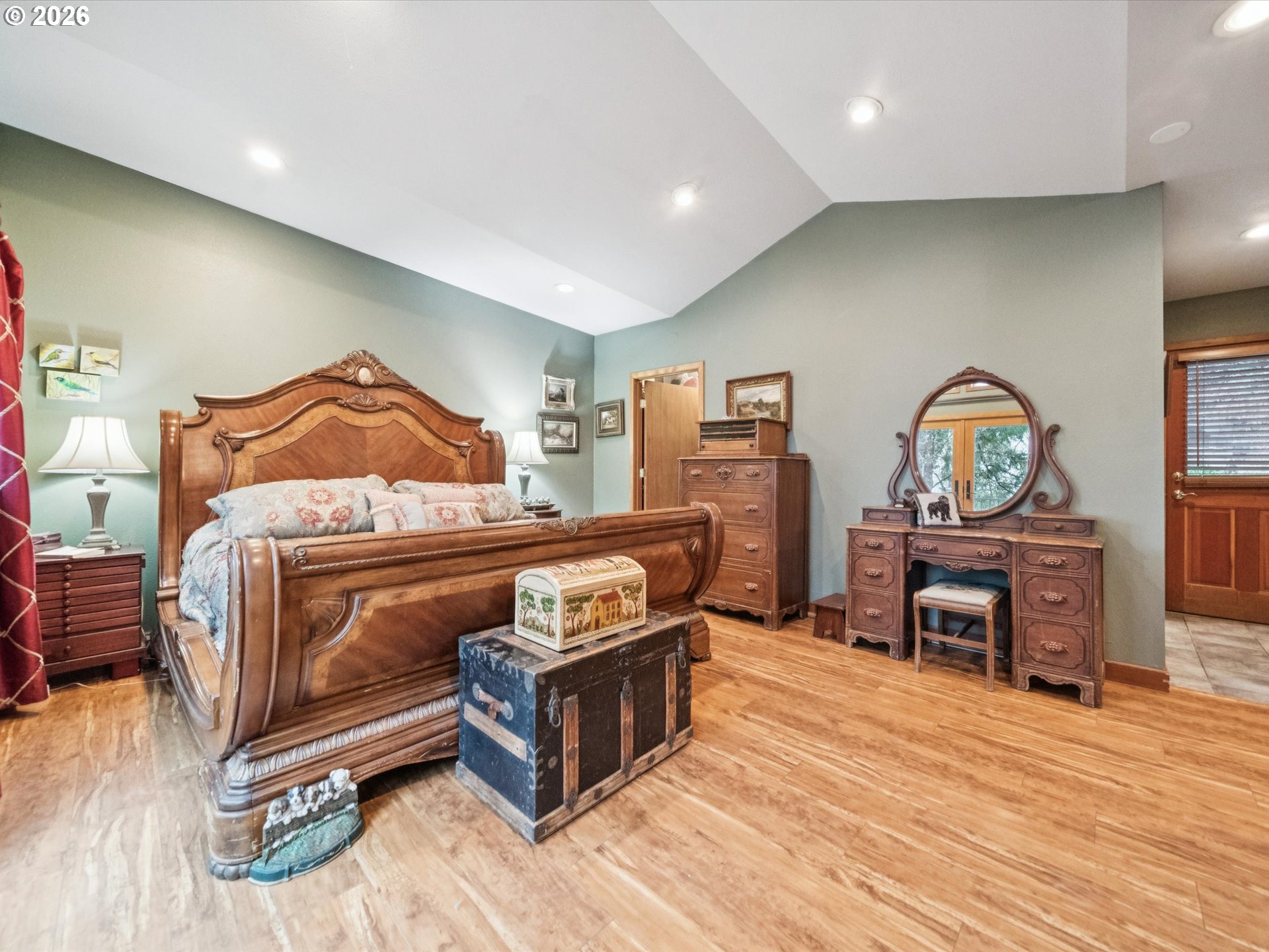 8401 Southwest Canyon Lane Portland, OR 97225 - Photo 36 of 48 a bedroom with furniture and a wooden floor
