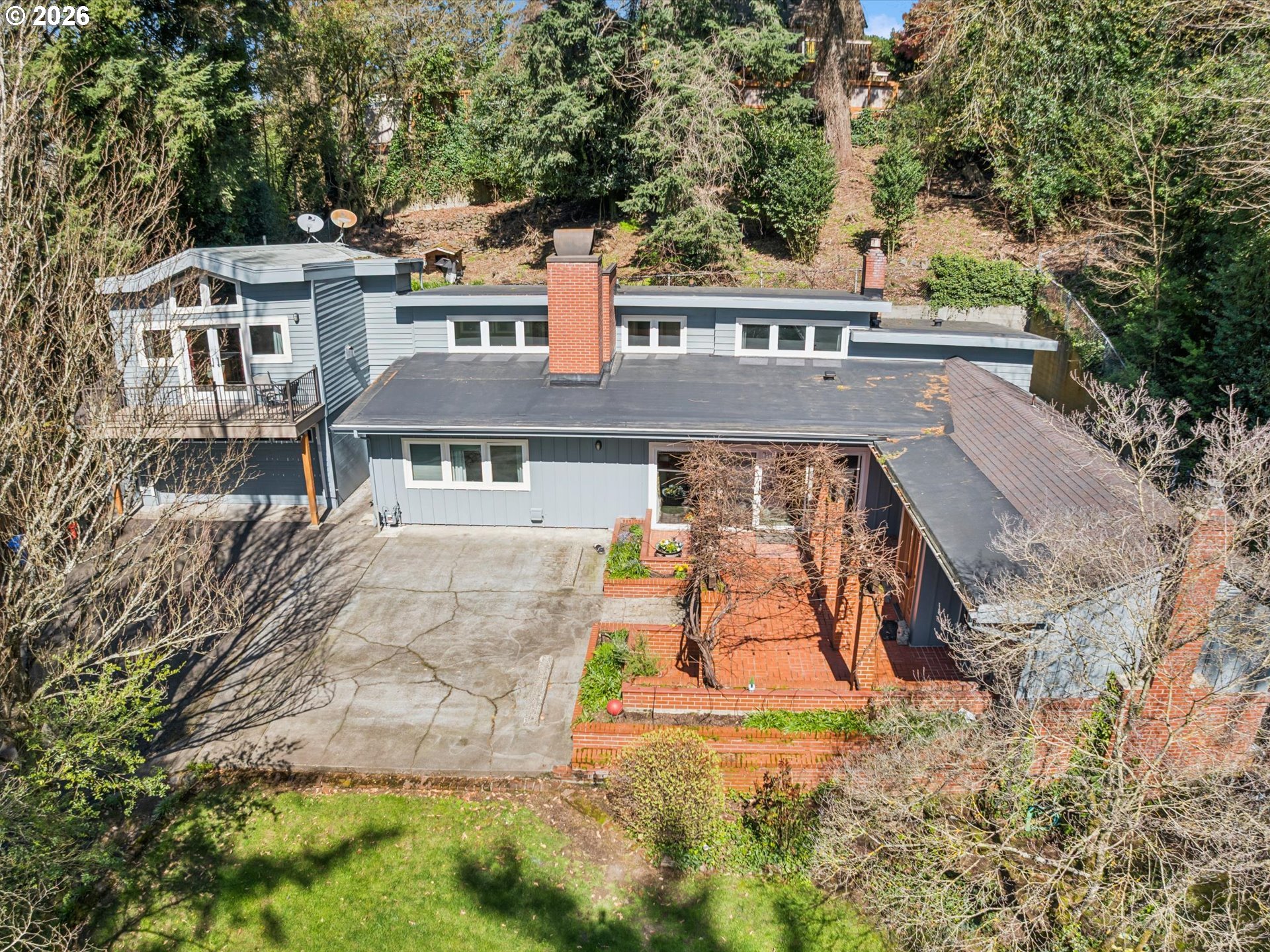 8401 Southwest Canyon Lane Portland, OR 97225 - Photo 42 of 48 front view of house with a yard