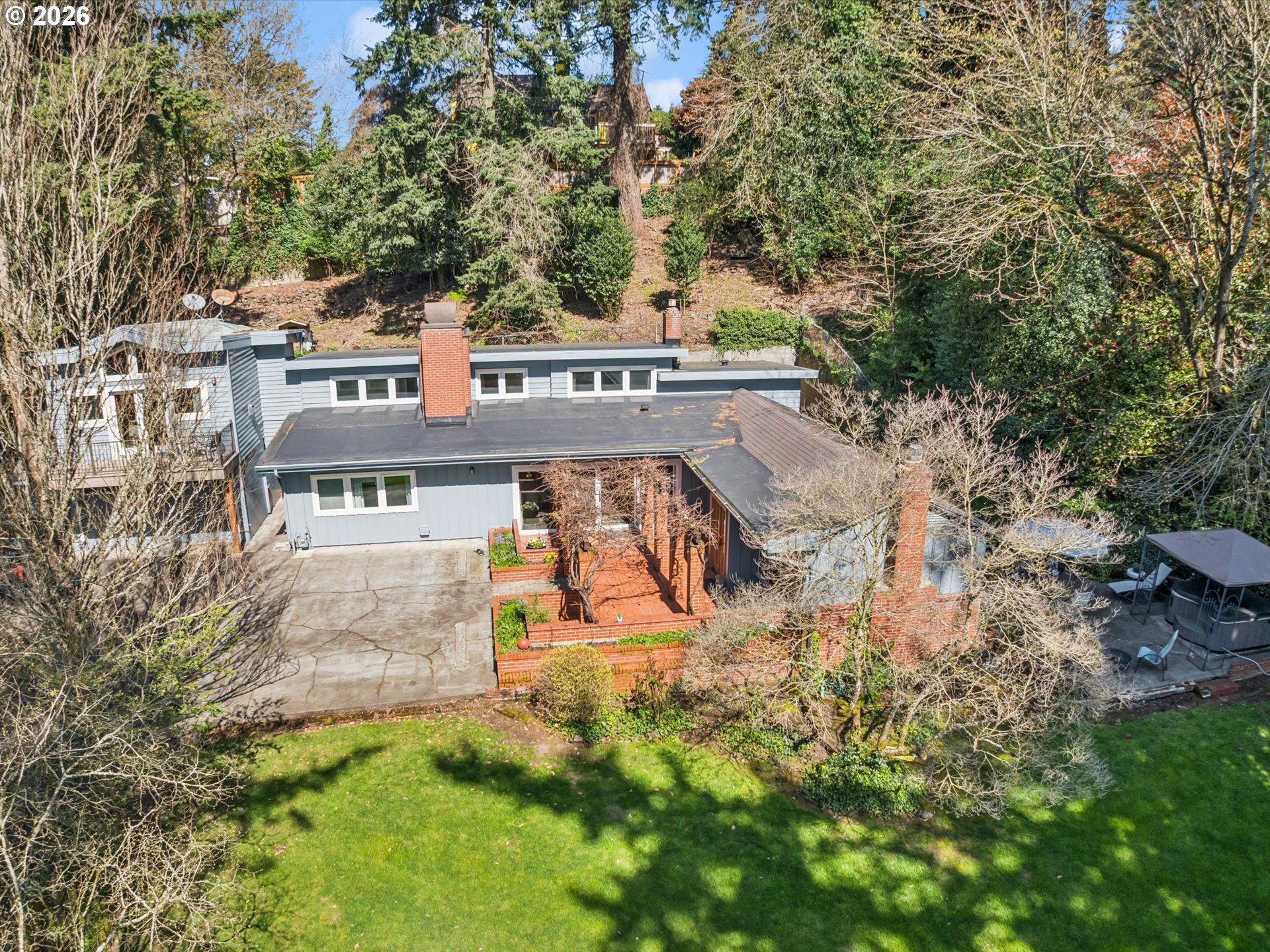8401 Southwest Canyon Lane Portland, OR 97225 - Photo 43 of 48 front view of house with a yard