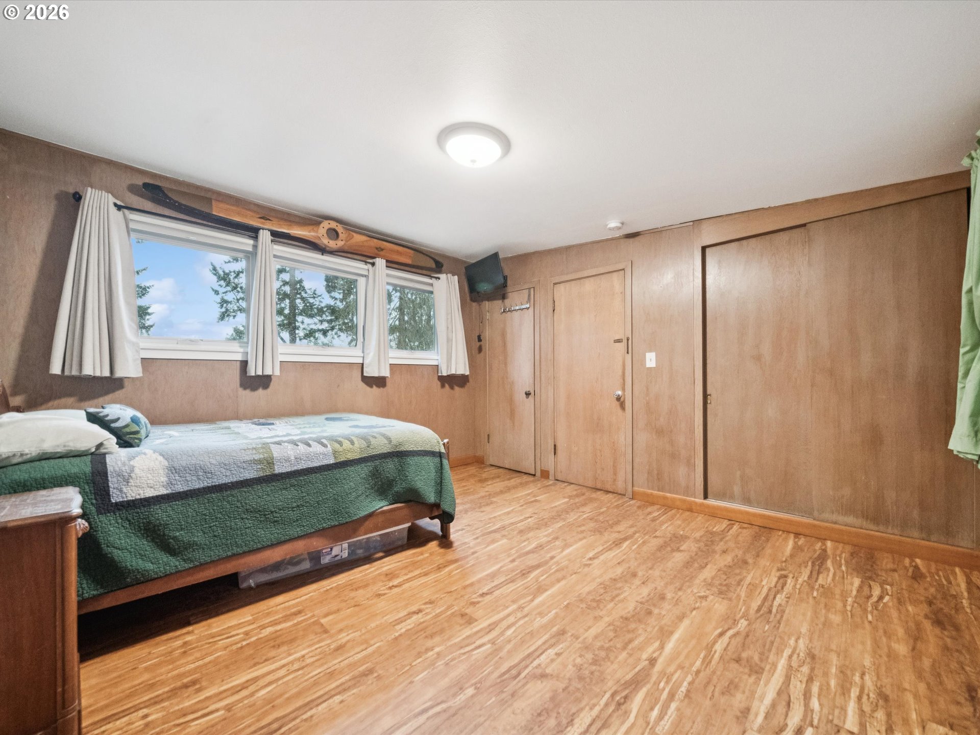 8401 Southwest Canyon Lane Portland, OR 97225 - Photo 10 of 48 a bedroom with a bed and a window