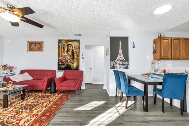 a view of a workspace with furniture