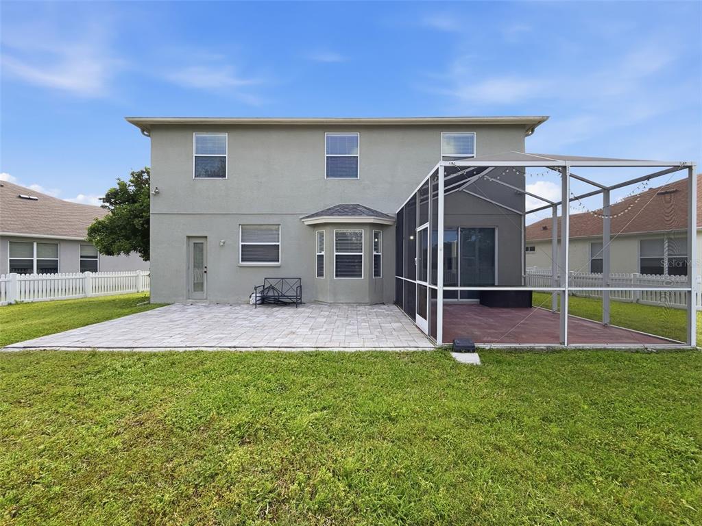 3311 Sisal Loop Wesley Chapel, FL 33544 - Photo 4 of 85 a view of a house with a yard porch and sitting area