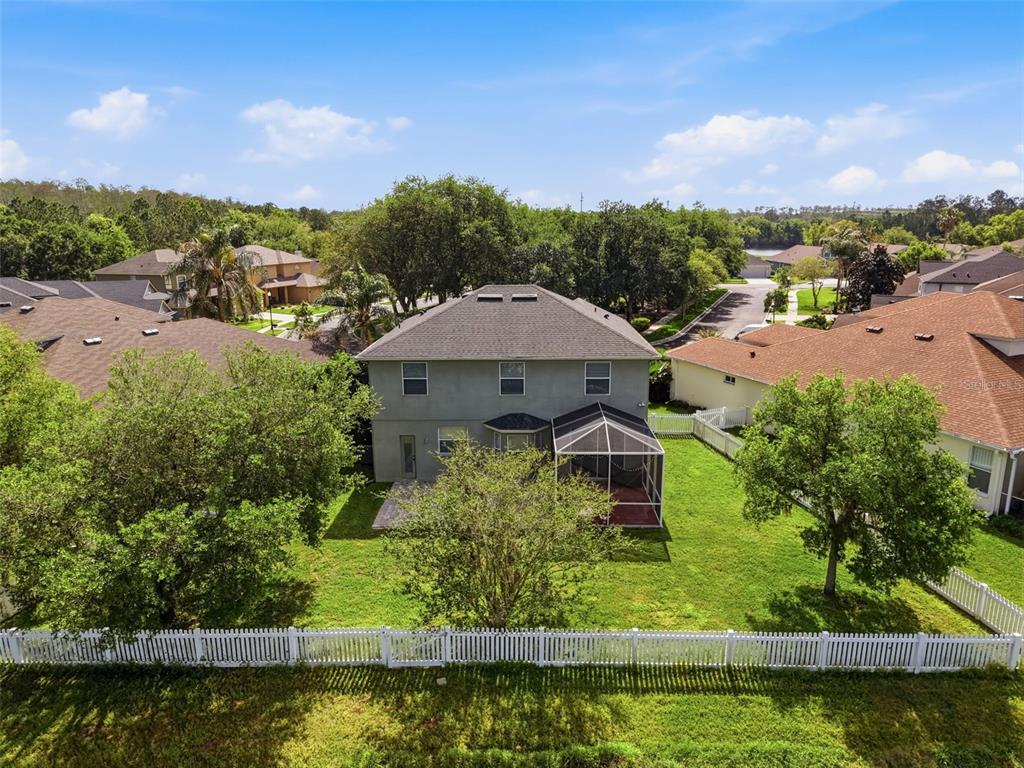 3311 Sisal Loop Wesley Chapel, FL 33544 - Photo 5 of 85 an aerial view of a house with a garden lake view