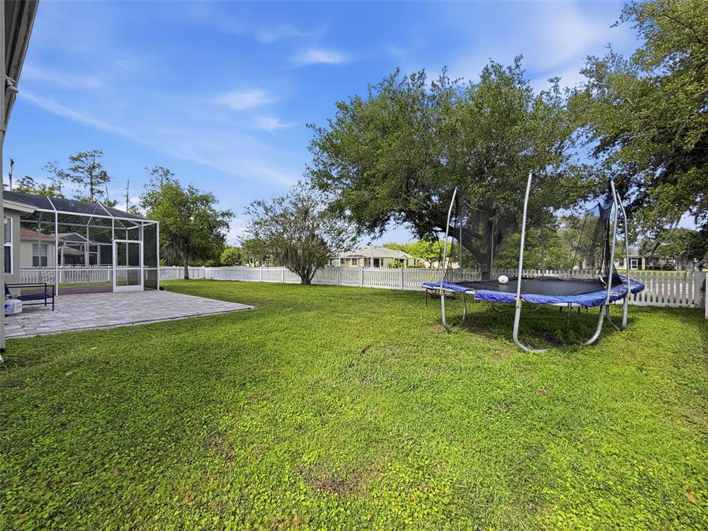 3311 Sisal Loop Wesley Chapel, FL 33544 - Photo 65 of 85 a view of a park with swings and slides