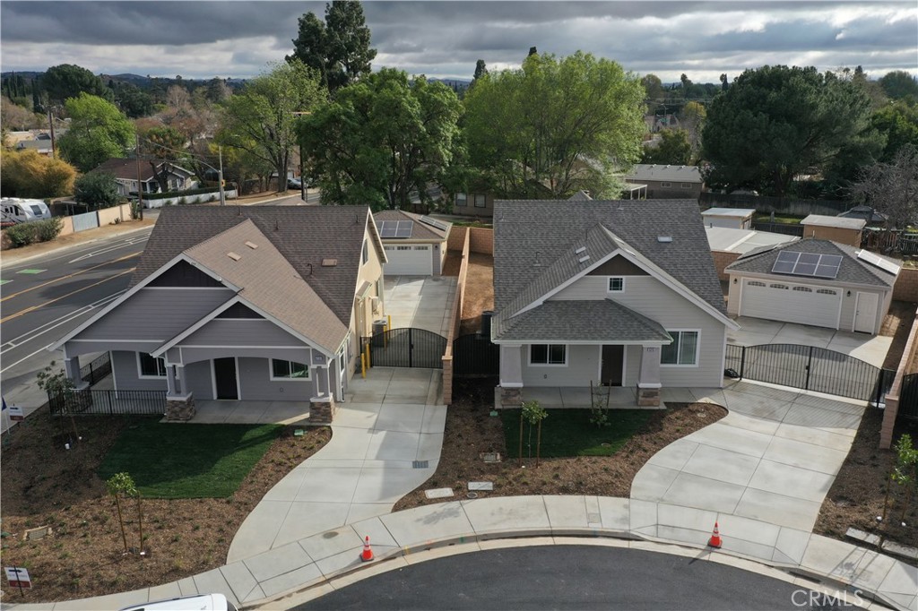 5215 Peony Court Riverside, CA 92506 - Photo 2 of 10 an aerial view of a house with a yard