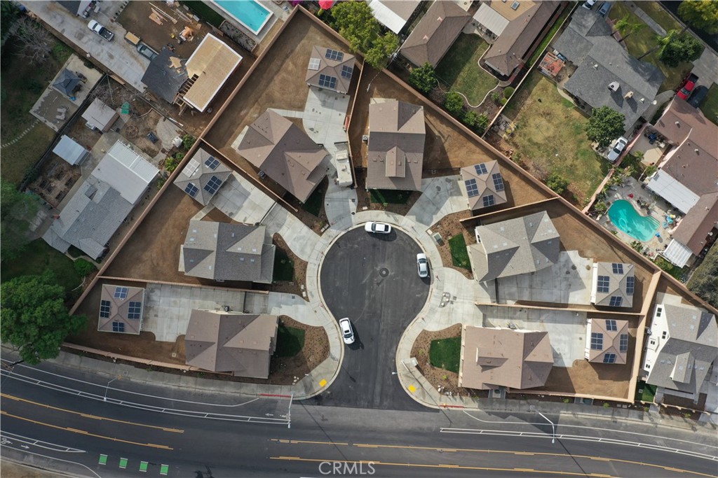 5215 Peony Court Riverside, CA 92506 - Photo 3 of 10 an aerial view of a house with a swimming pool