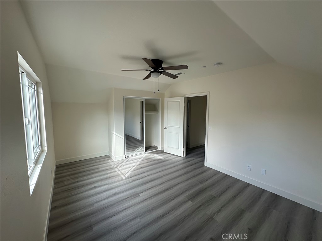 5215 Peony Court Riverside, CA 92506 - Photo 10 of 10 wooden floor in an empty room with a window