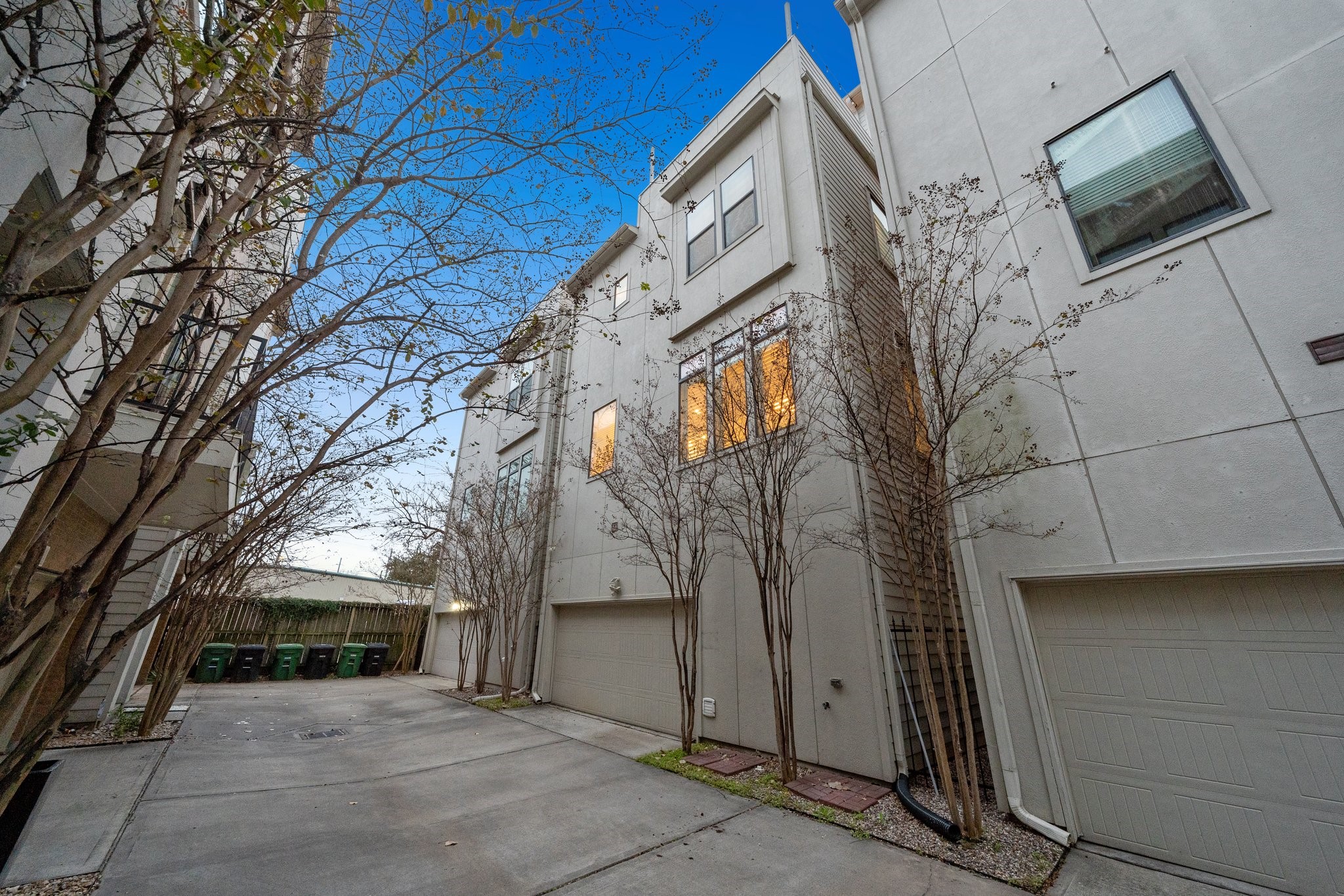 2105 Mason Street Houston, TX 77006 - Photo 41 of 43 Private rear access leads directly to the two-car garage, making arrivals and departures simple and secure. A practical layout for daily routines while keeping the main living spaces elevated and quiet.