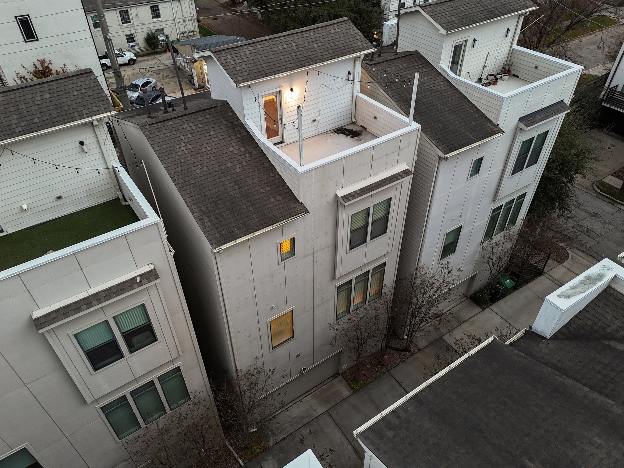 2105 Mason Street Houston, TX 77006 - Photo 43 of 43 A bird’s-eye look highlights the home’s multiple outdoor spaces, including the rooftop terrace and additional balcony areas. With four full levels and flexible indoor-outdoor living, the layout is designed to maximize space, light, and views.