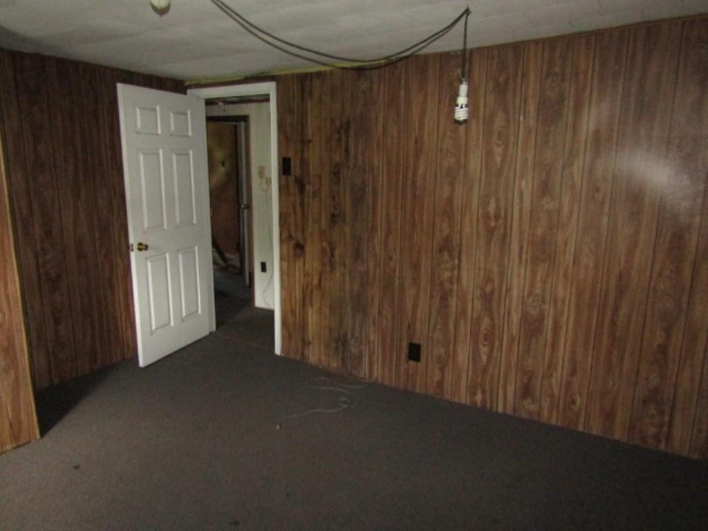 112 Wall Street Everson, PA 15631 - Photo 23 of 28 a view of a room has wooden walls