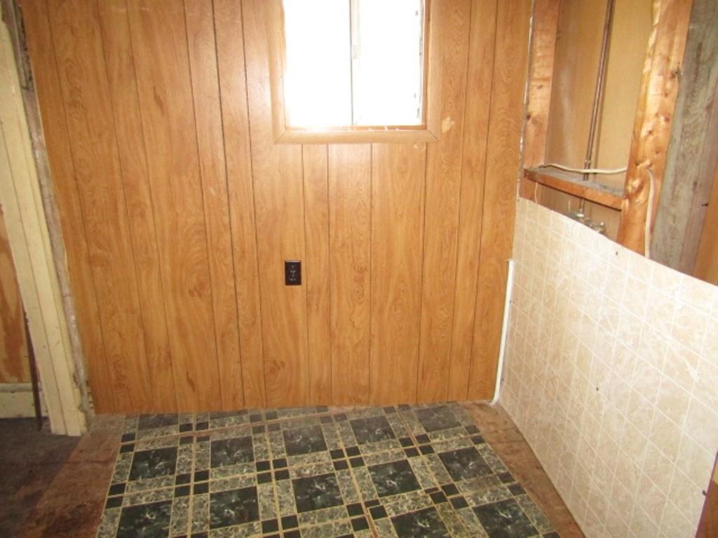 112 Wall Street Everson, PA 15631 - Photo 26 of 28 a view of a bathroom with shower curtain