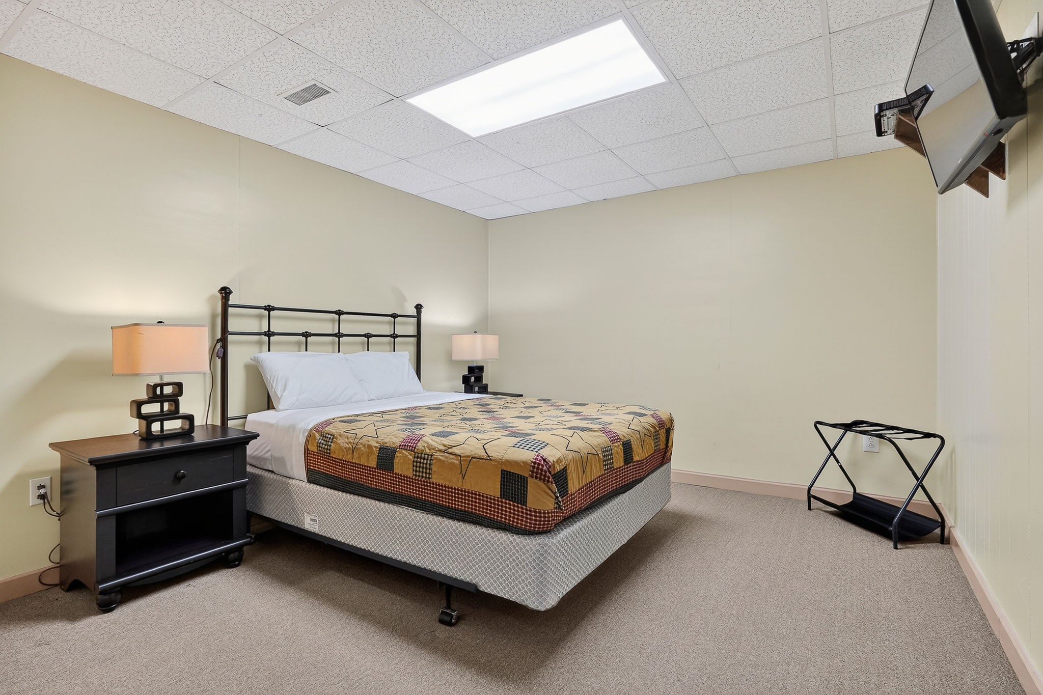 5642 Pates Ford Road Smithville, TN 37166 - Photo 26 of 32 a bedroom with a bed and cabinets