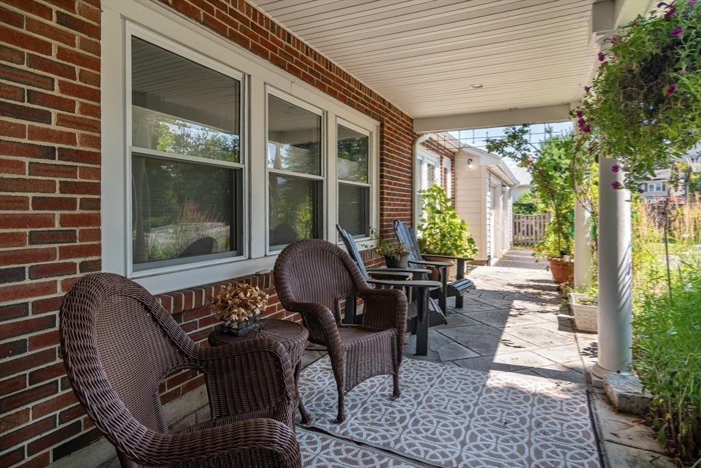 1 Cheryl Road Natick, MA 01760 - Photo 2 of 31 a outdoor living space with furniture and a potted plant