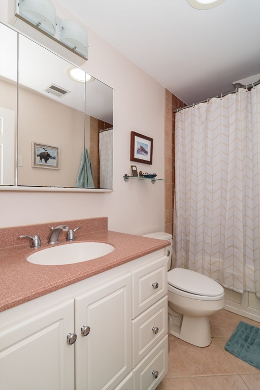 1 Cheryl Road Natick, MA 01760 - Photo 21 of 31 a bathroom with a sink toilet and shower