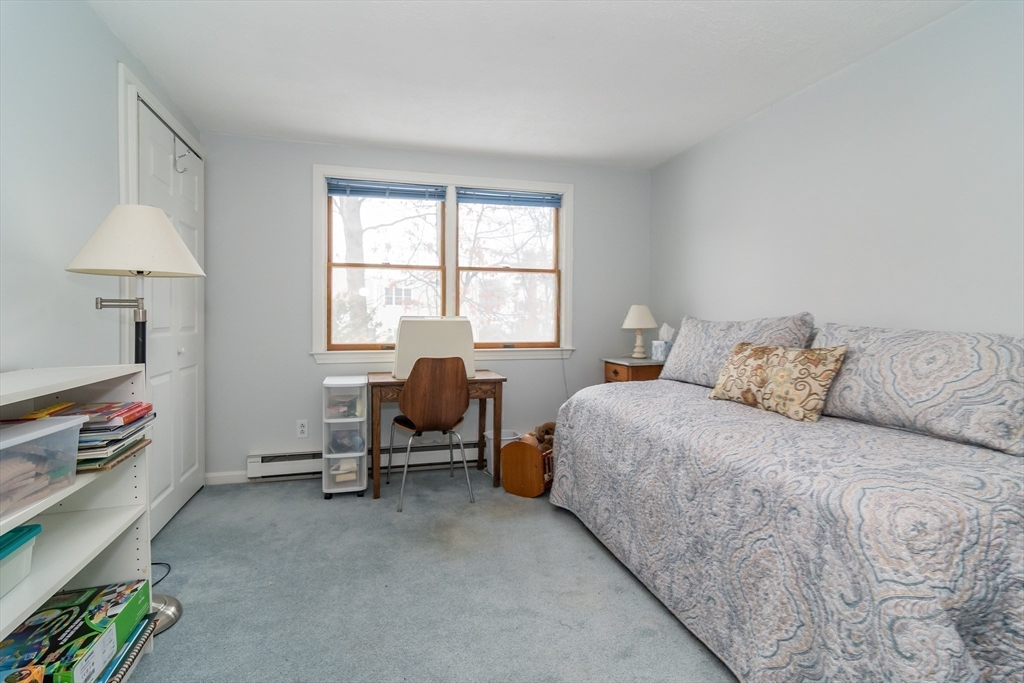1 Cheryl Road Natick, MA 01760 - Photo 22 of 31 a bedroom with a bed and a window