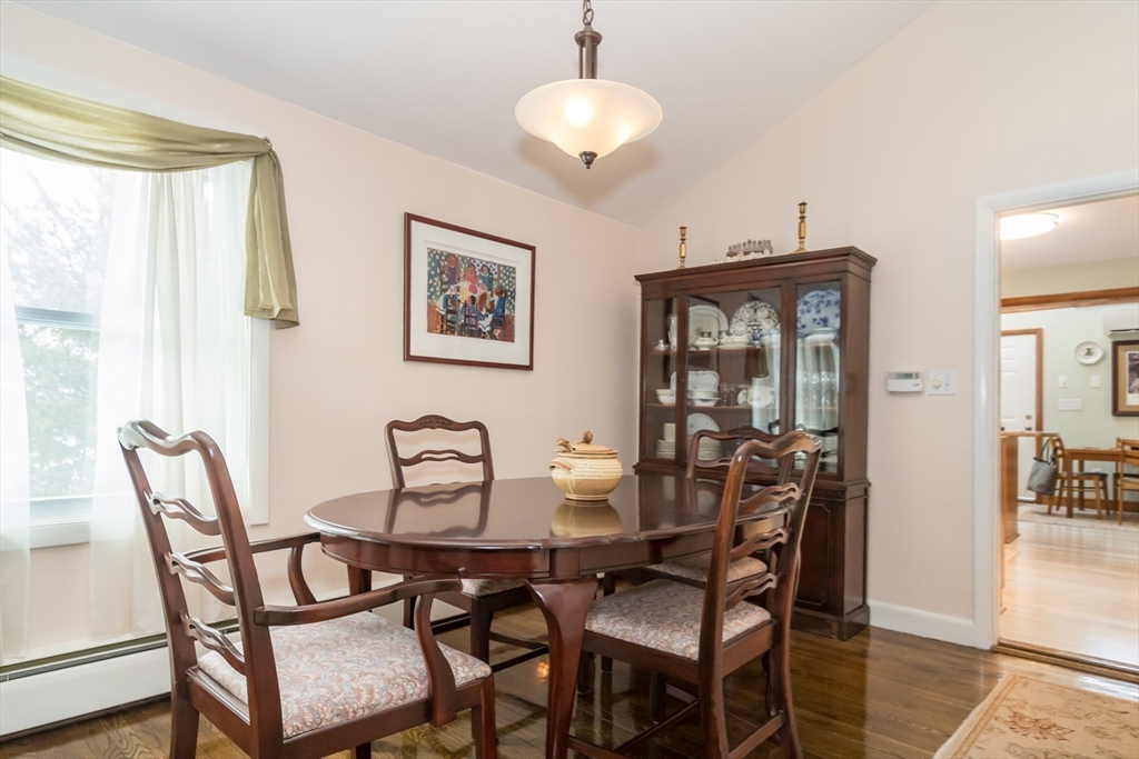 1 Cheryl Road Natick, MA 01760 - Photo 9 of 31 a view of a dining room with furniture and wooden floor
