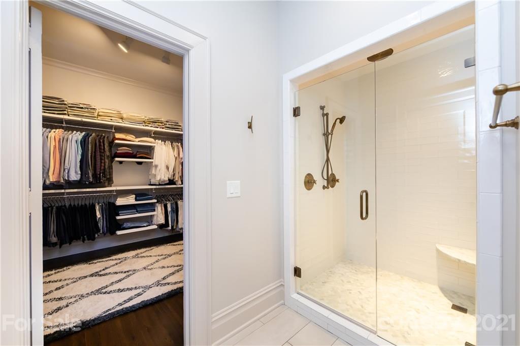 2230 Sharon Road Charlotte, NC 28207 - Photo 11 of 43 a bathroom with a shower