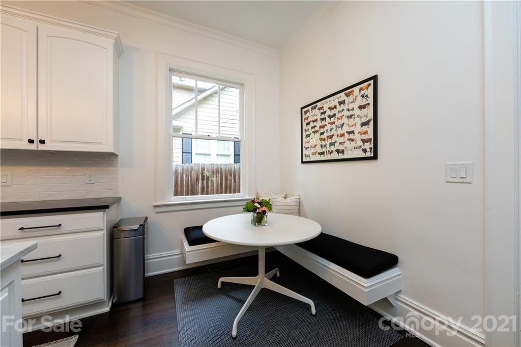2230 Sharon Road Charlotte, NC 28207 - Photo 24 of 43 a dining room with furniture and window