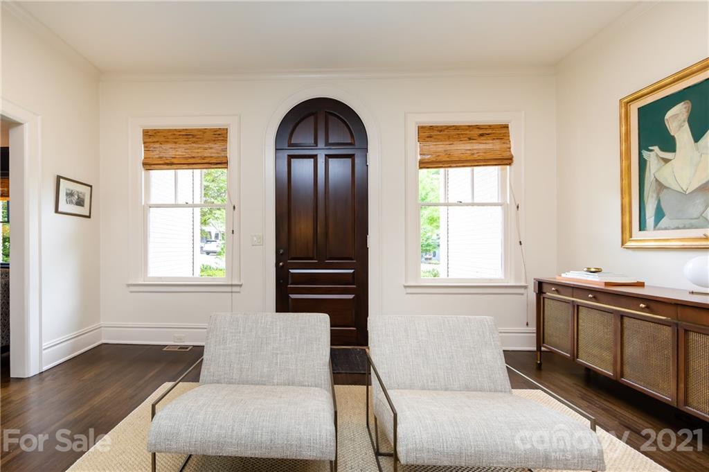 2230 Sharon Road Charlotte, NC 28207 - Photo 4 of 43 a living room with furniture and windows
