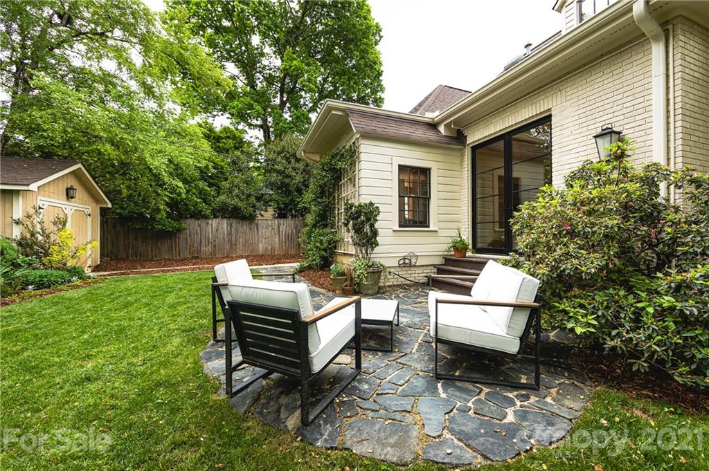 2230 Sharon Road Charlotte, NC 28207 - Photo 43 of 43 a view of a house with backyard and sitting area