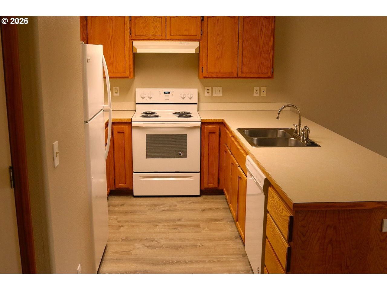 460 Autumn Avenue Eugene, OR 97404 - Photo 6 of 21 a kitchen with a stove a sink and a microwave