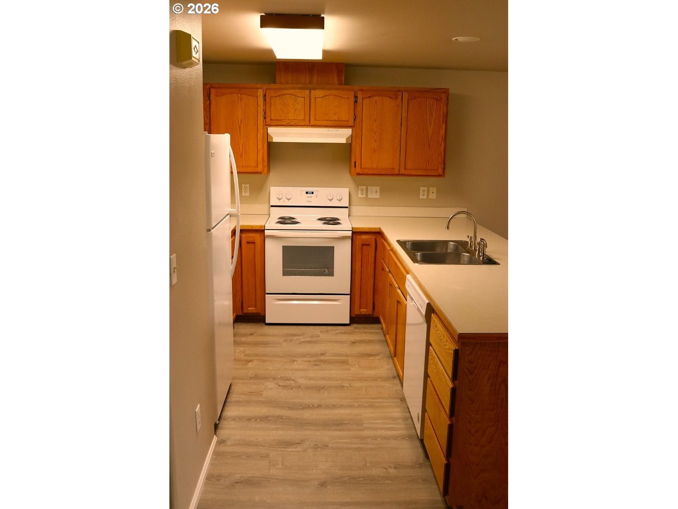 460 Autumn Avenue Eugene, OR 97404 - Photo 7 of 21 a kitchen with a sink and cabinets