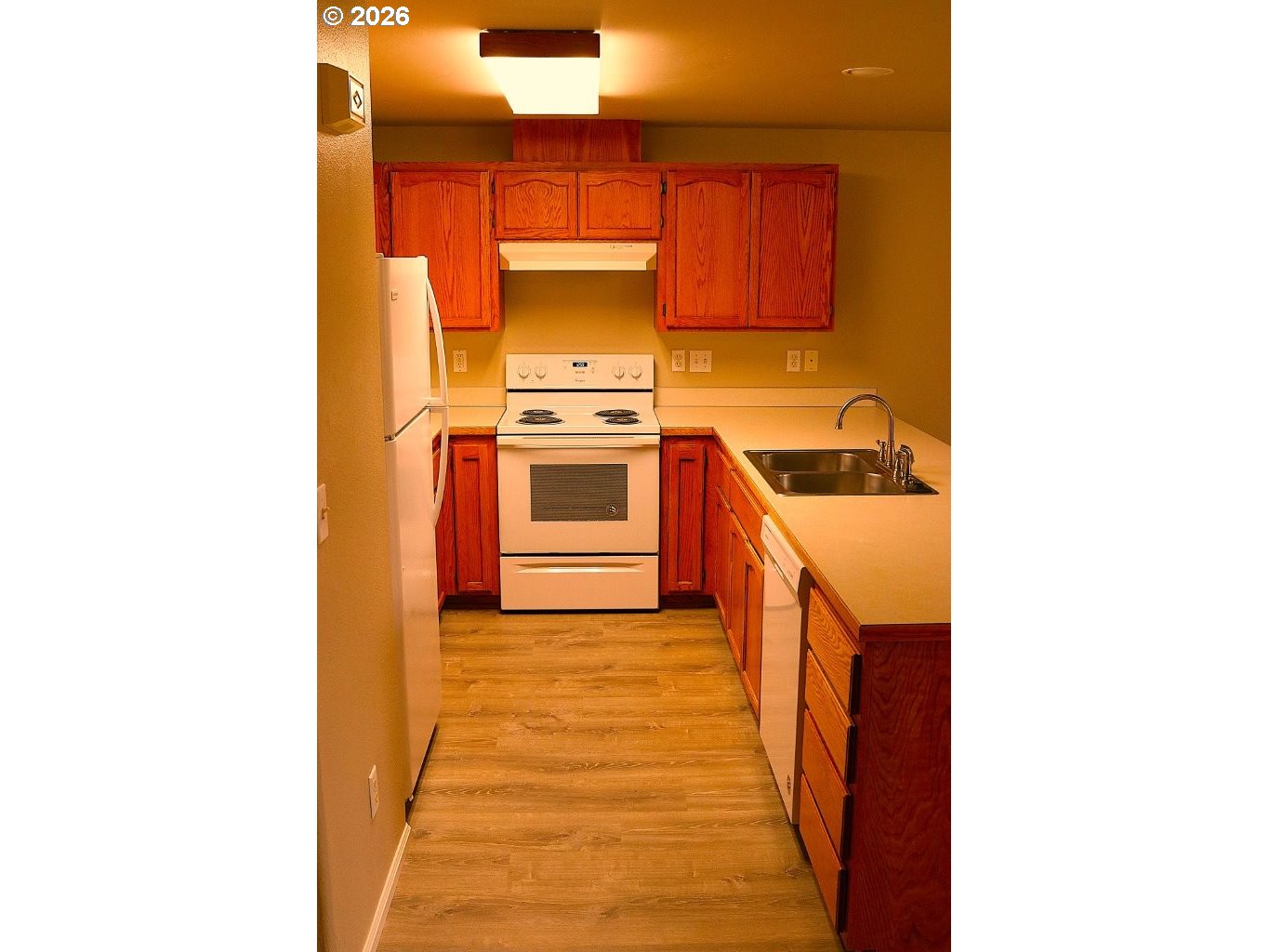 460 Autumn Avenue Eugene, OR 97404 - Photo 8 of 21 a picture of a kitchen with a sink and cabinets