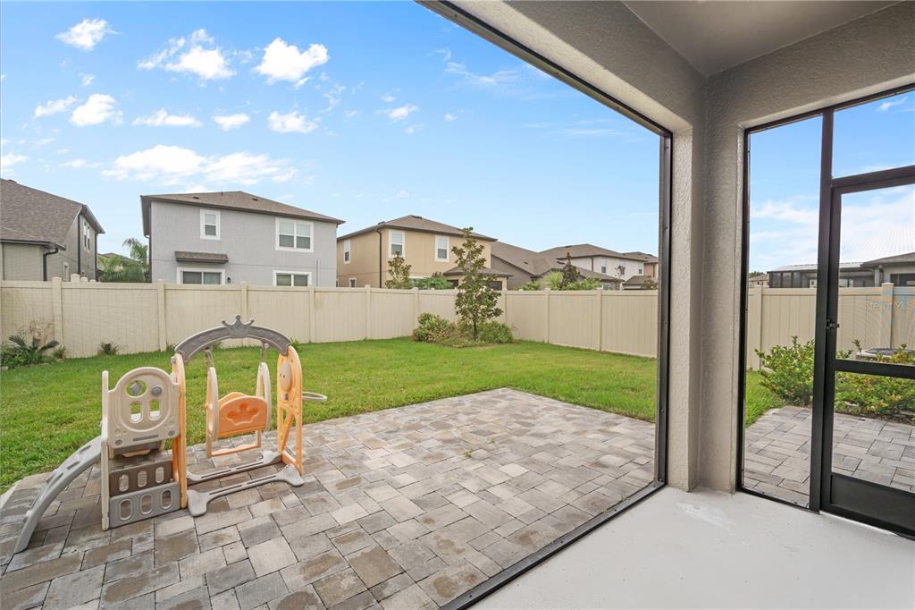 37820 Beacon Brick Drive Zephyrhills, FL 33540 - Photo 20 of 26 a view of outdoor space yard and balcony