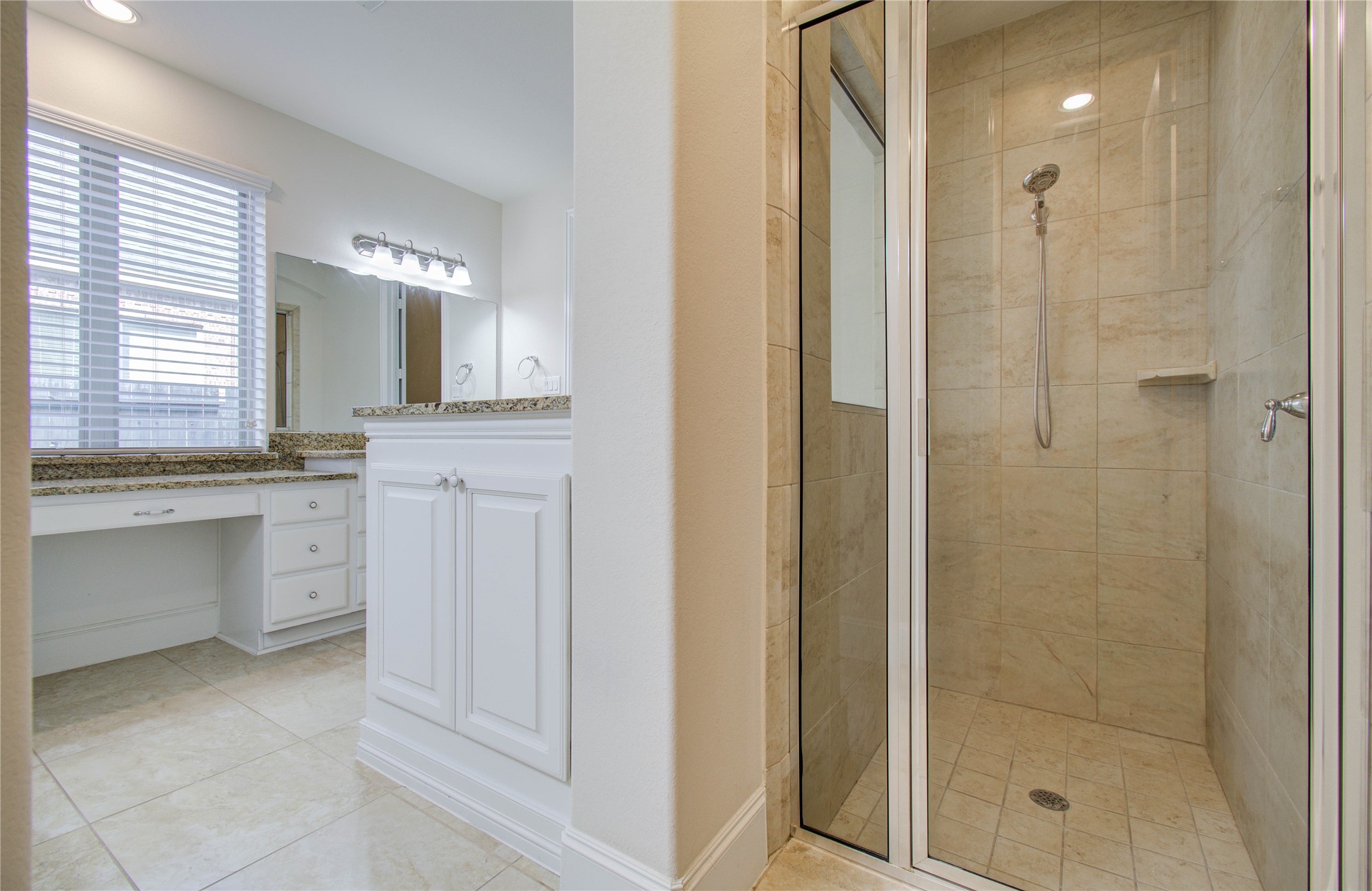 10202 South Goshawk Trail Conroe, TX 77385 - Photo 22 of 50 The primary bedroom has plenty of space, windows that overlook the yard and garden, and a bathroom fit for a King and/or Queen.