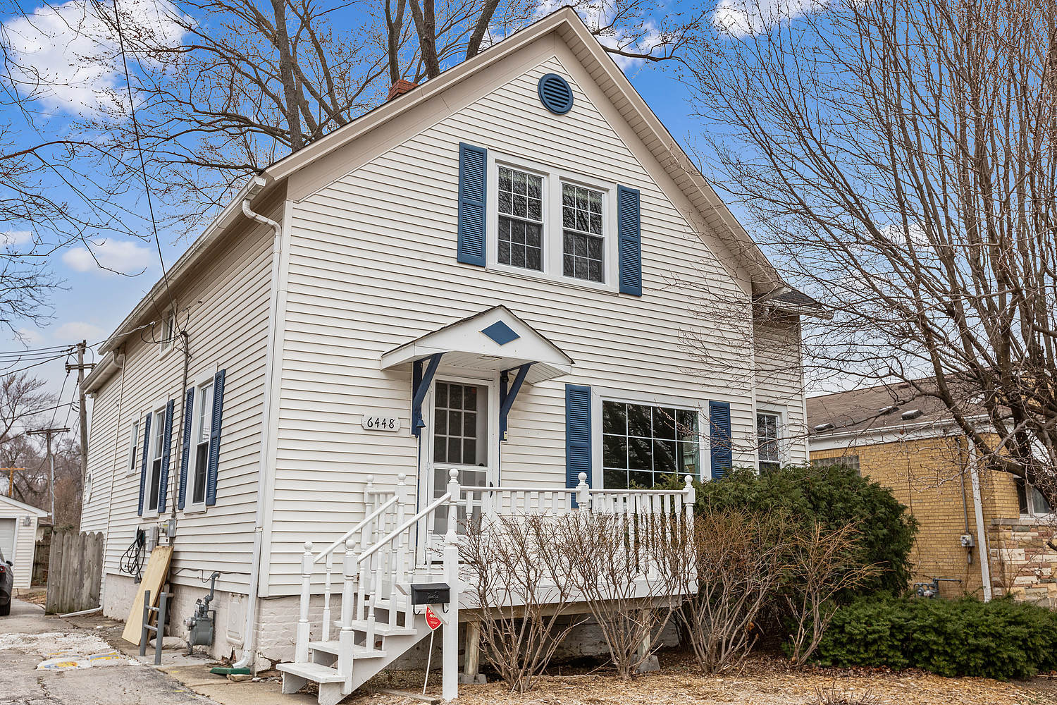 6448 175th Street Tinley Park, IL 60477 - Photo 1 of 18 a front view of a house with a balcony