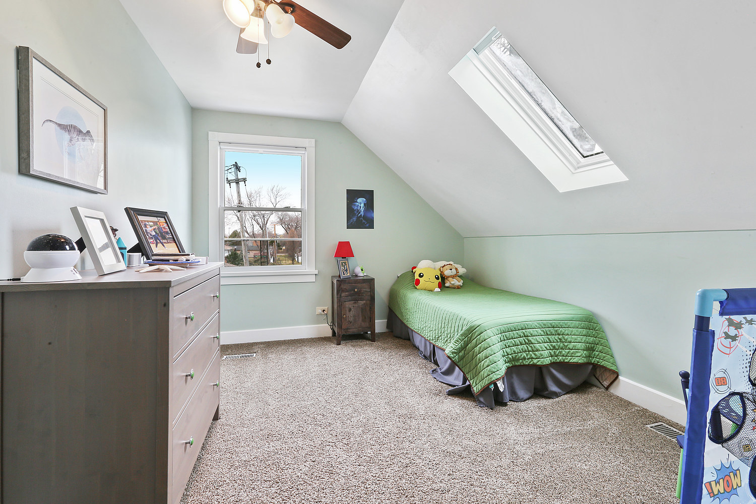 6448 175th Street Tinley Park, IL 60477 - Photo 15 of 18 a bedroom with a bed and a chandelier