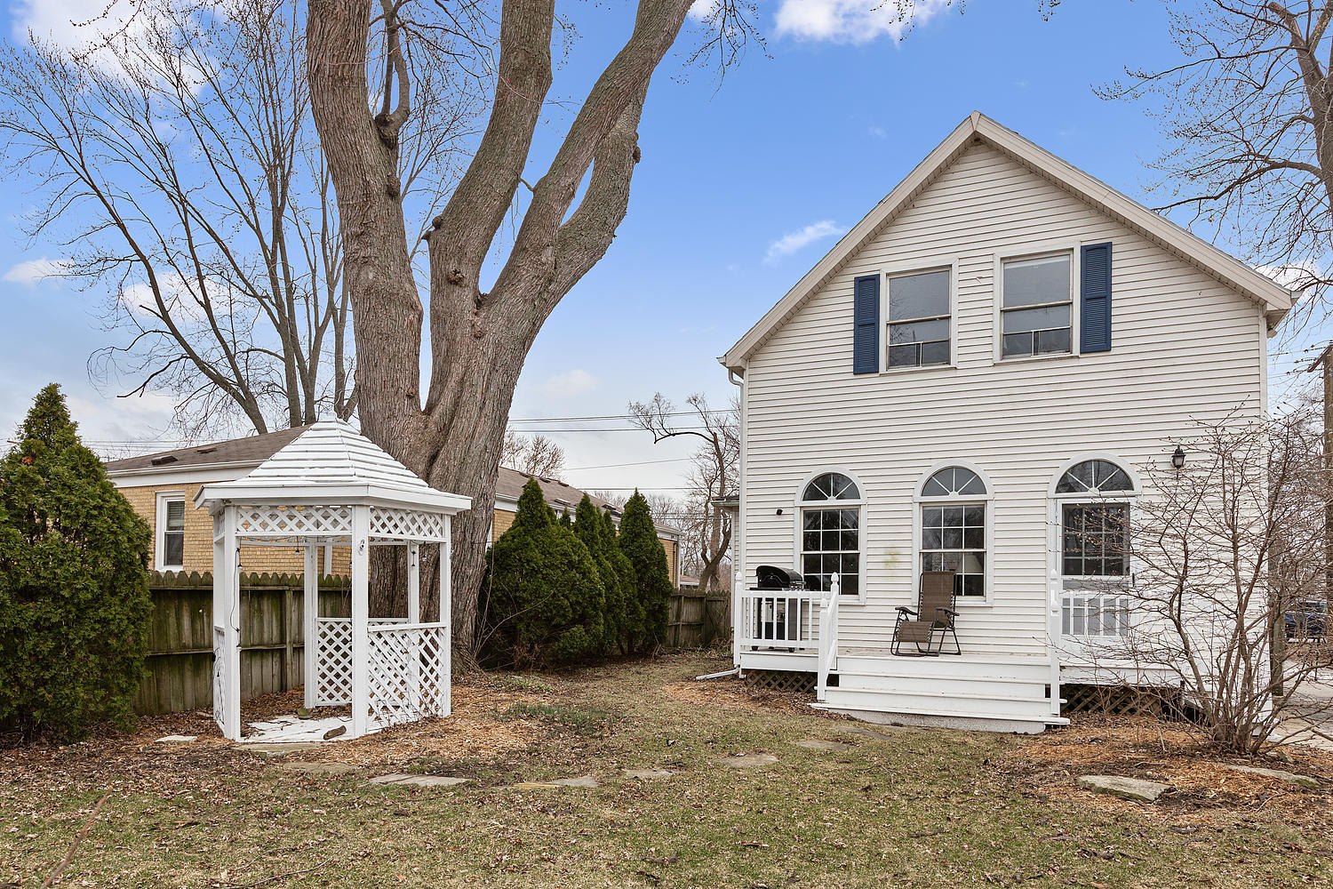6448 175th Street Tinley Park, IL 60477 - Photo 17 of 18 a front view of a house with a yard