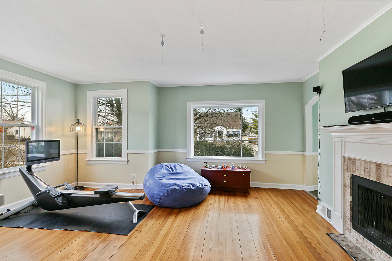 6448 175th Street Tinley Park, IL 60477 - Photo 3 of 18 a living room with furniture and a fireplace