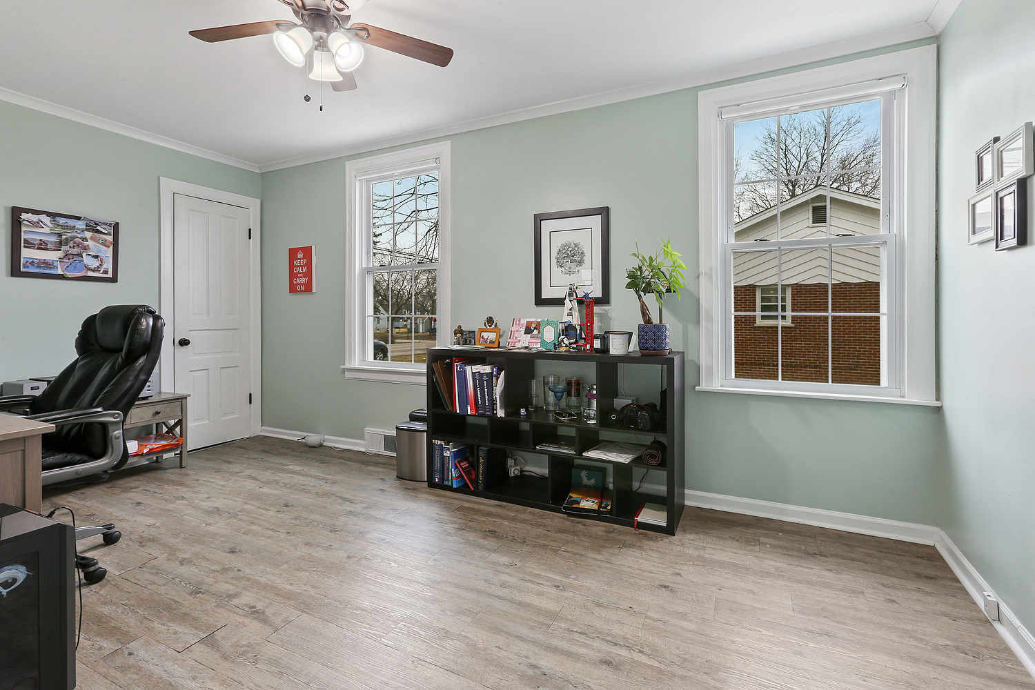 6448 175th Street Tinley Park, IL 60477 - Photo 6 of 18 a view of a workspace with furniture and a window