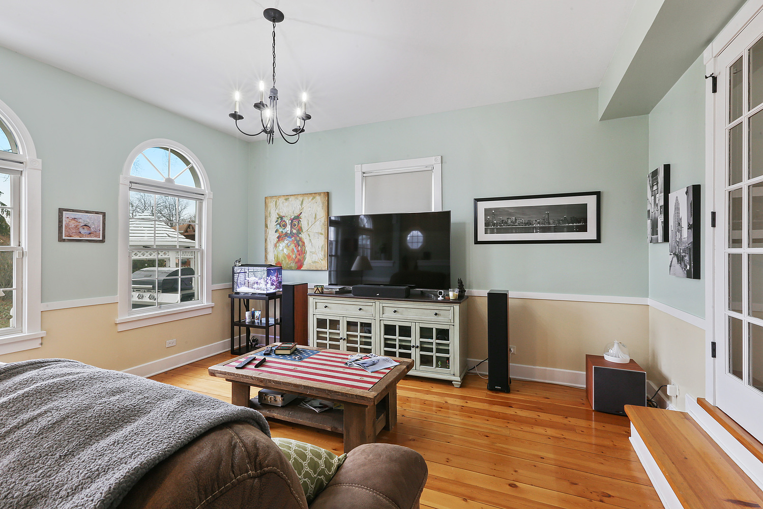 6448 175th Street Tinley Park, IL 60477 - Photo 8 of 18 a living room with furniture and a flat screen tv