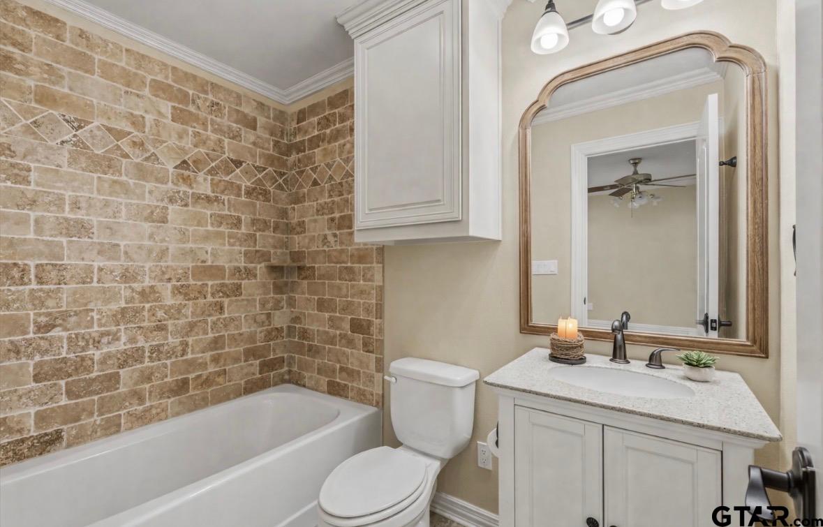 14740 Fm 1255 Canton, TX 75103 - Photo 15 of 40 a bathroom with a granite countertop sink toilet and shower