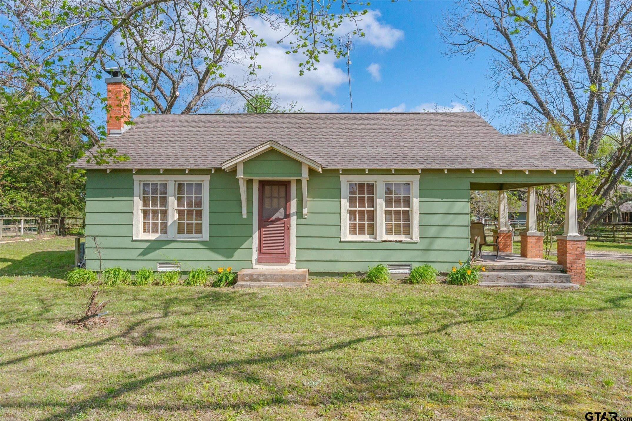 14740 Fm 1255 Canton, TX 75103 - Photo 31 of 40 a front view of a house with a yard