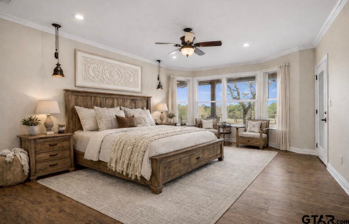 14740 Fm 1255 Canton, TX 75103 - Photo 6 of 40 a spacious bedroom with a bed a window and a chandelier