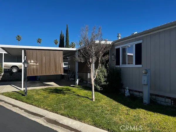 a view of a back yard of the house