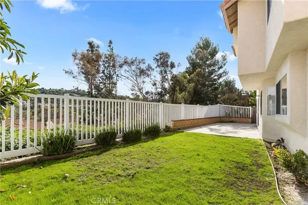 a view of a backyard with a garden