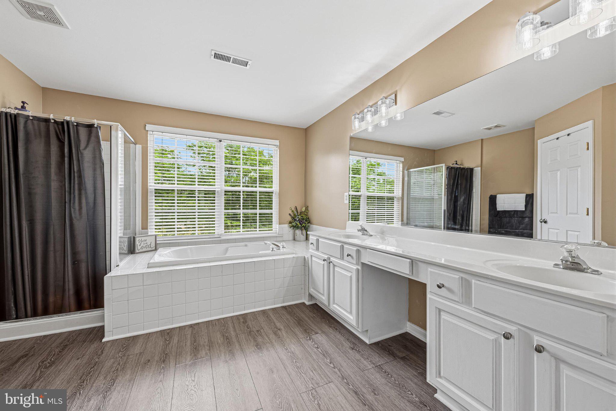 602 Shanks Evans Road Northeast Leesburg, VA 20176 - Photo 26 of 43 Spacious, serene bathroom retreat.