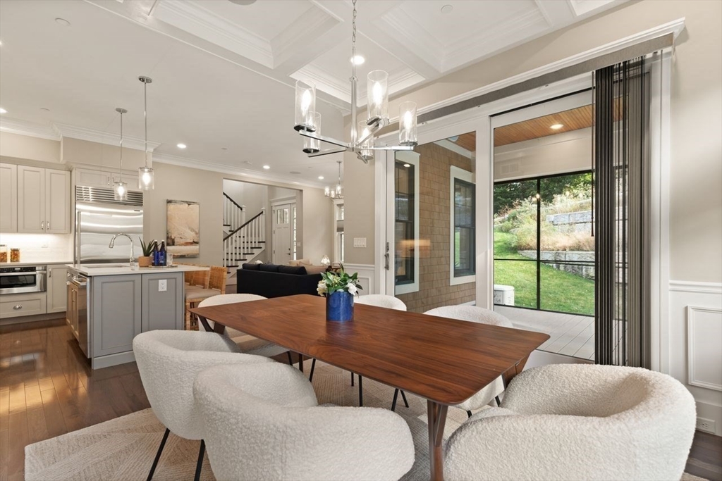 5 Gershon Way, Unit 5 Winchester, MA 01890 - Photo 11 of 27 a view of a dining room with furniture window and wooden floor