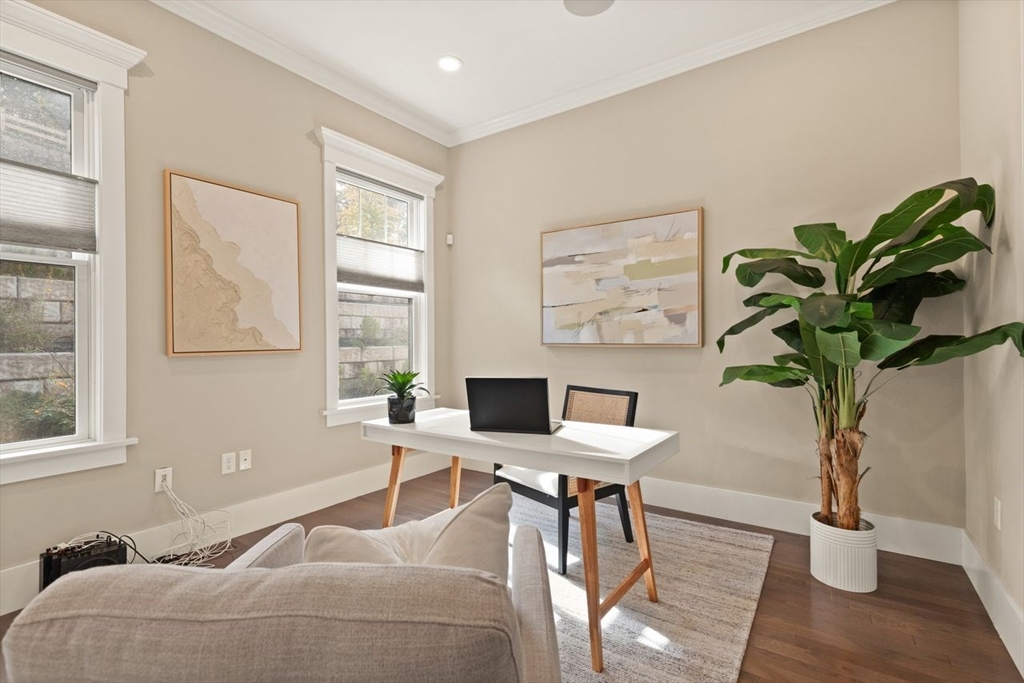 5 Gershon Way, Unit 5 Winchester, MA 01890 - Photo 12 of 27 a living room with furniture a potted plant and a window