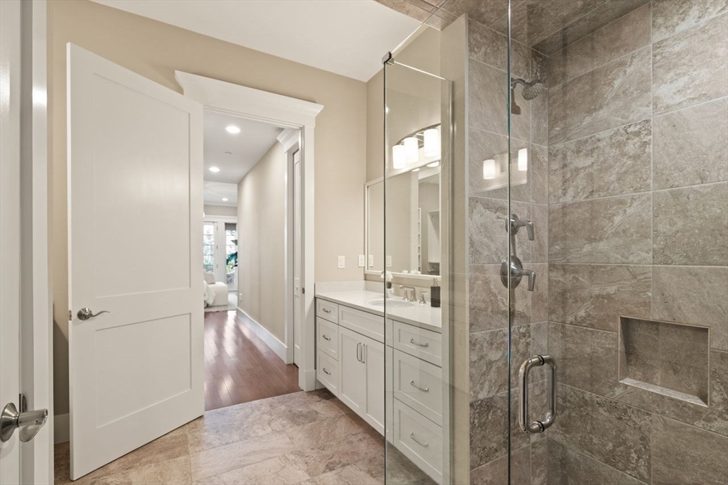 5 Gershon Way, Unit 5 Winchester, MA 01890 - Photo 16 of 27 a bathroom with a shower and a sink