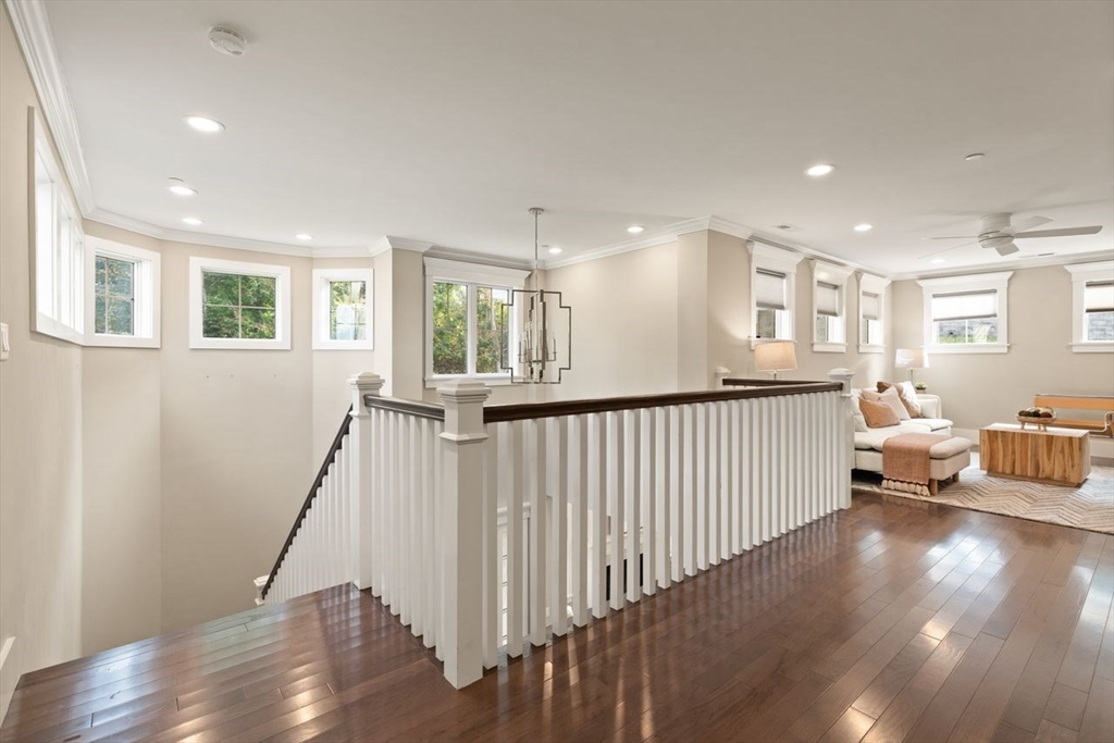 5 Gershon Way, Unit 5 Winchester, MA 01890 - Photo 18 of 27 a view of a hallway with windows and stairs