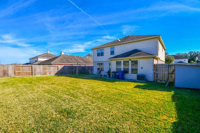 a view of a house with swimming pool