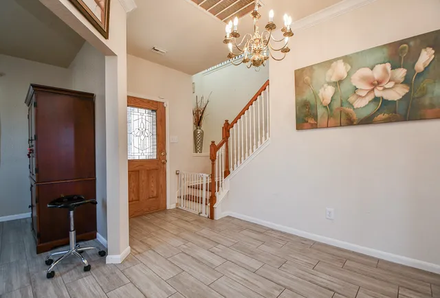 a view of entryway with wooden floor