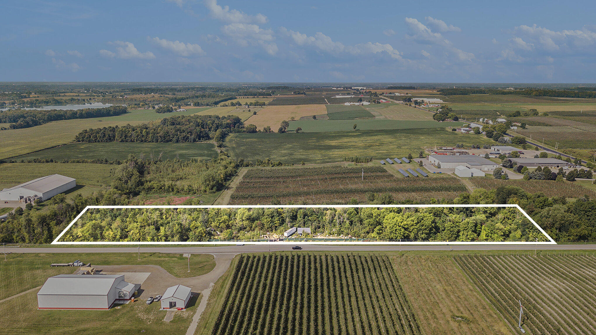 8251 Fruit Ridge Avenue Northwest Sparta, MI 49345 - Photo 1 of 12 Approximate lot lines